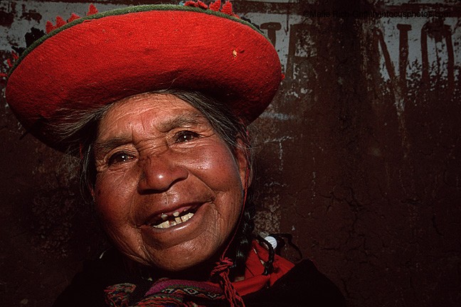 Quecha Woman Laughter Red Hat Chinchero