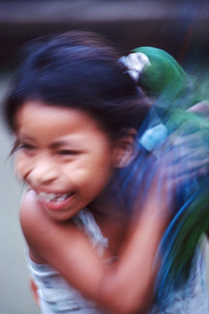 Young Amazon Girl and Pet Parrot Caracaro Huyate