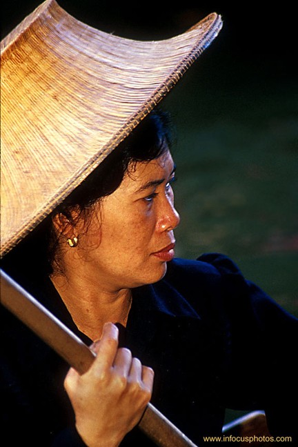 Thai Woman Poling Canoe on Klong Straw Hat