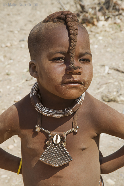 Infocusphotos : Little Himba Girl with Crumbs and Attitude, Kamanjab, Namibia