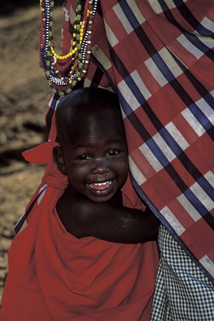 Little Boy Clings Mother